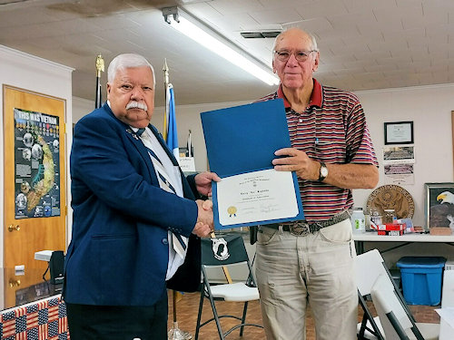 President Clarence Burns presents Vice-President Larry Joe Reynolds<br />a Certificate of Appreciation for his presentation of The Battles of the Saratoga.